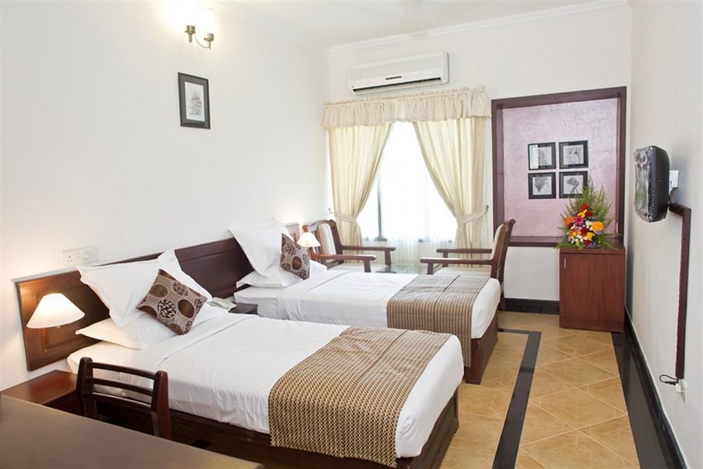 Hotel Pookodans International Kondotty Buitenkant foto